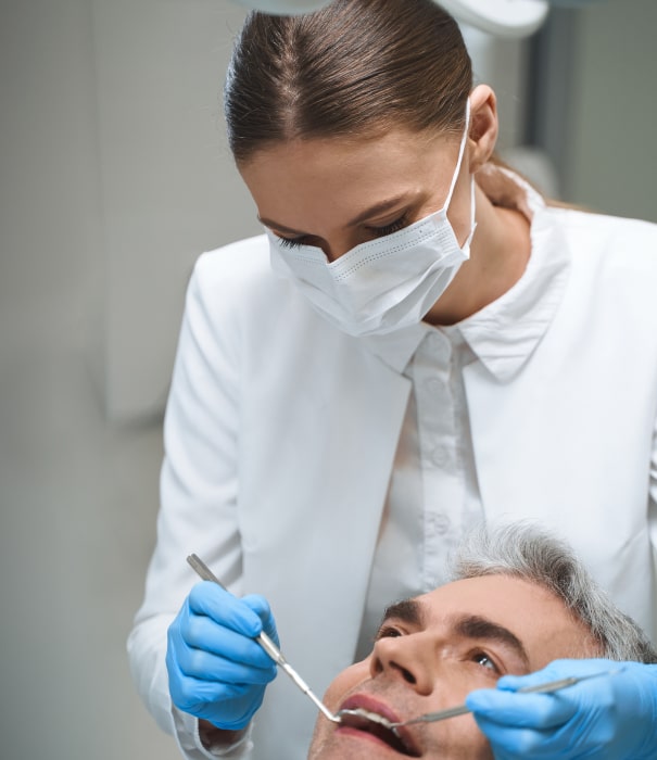 implant retained dentures top min