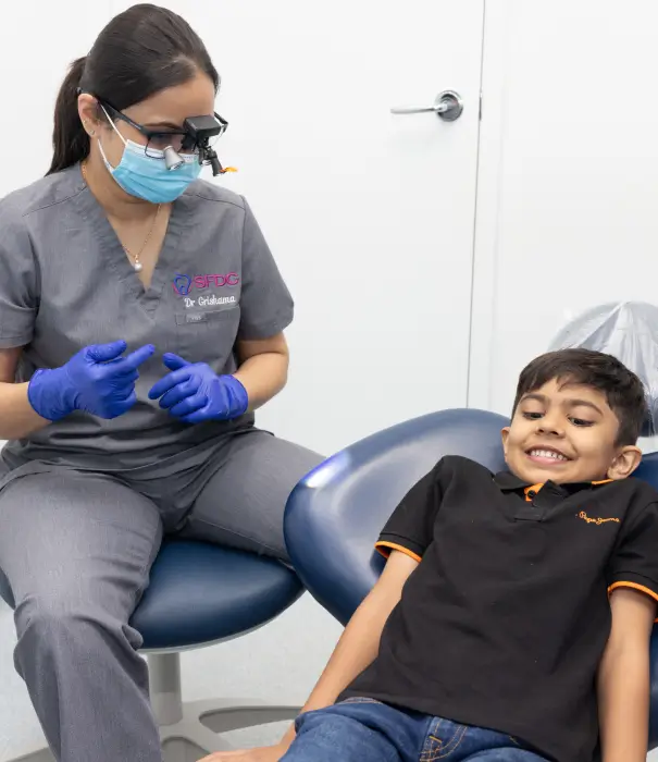 Child smiling during a friendly dental check-up with Dr Grishma at Southside Friendly Dental Care