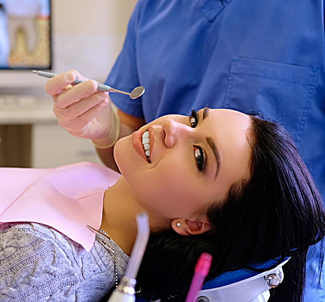dentist hands working young woman patient with dental tools