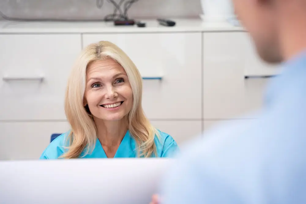 Dentist consulting with a patient before recommending personalised dental treatment