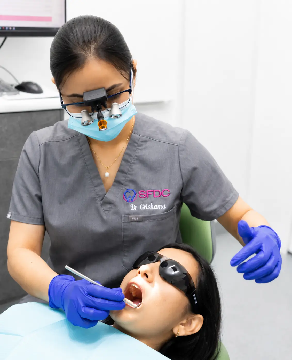 Dr Grishma examining a patient at Southside Friendly Dental Care