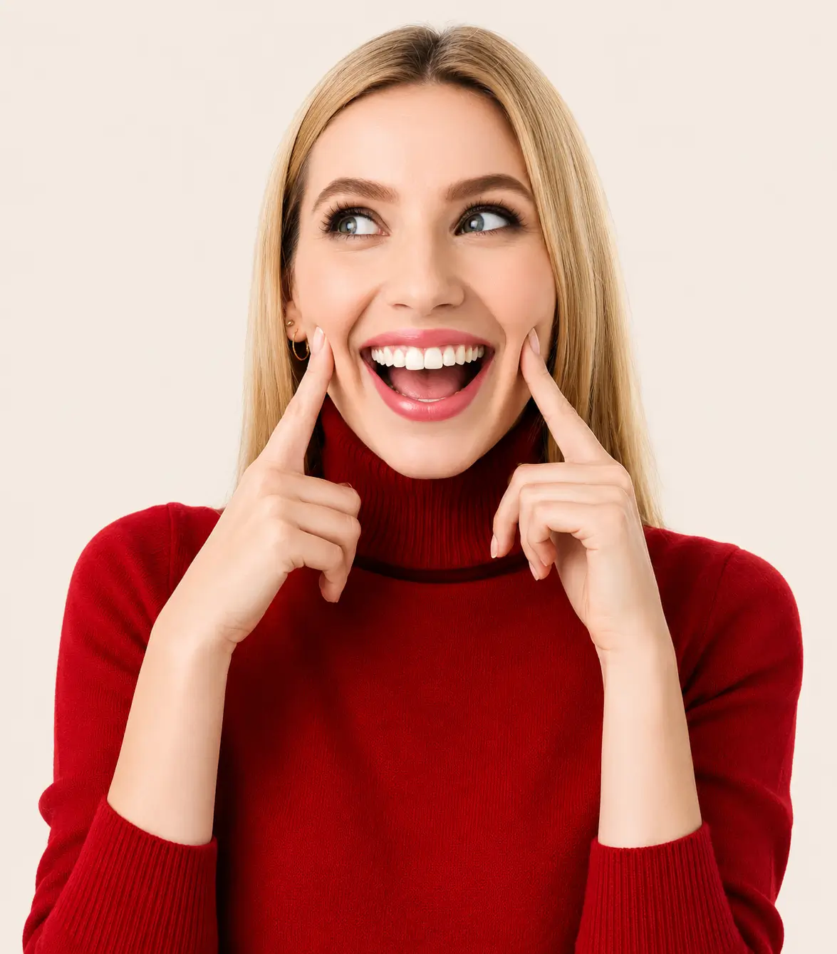 Person smiling and pointing to their cheeks