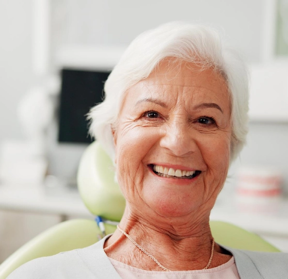 senior patient dental smile sitting on chair
