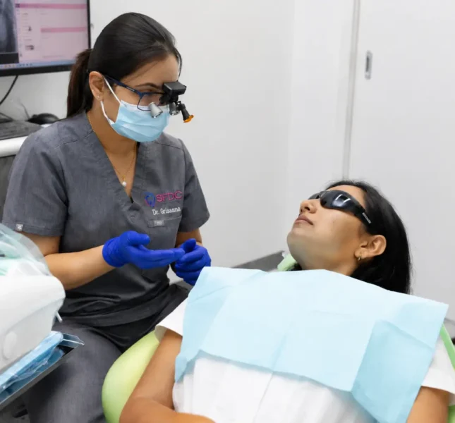 Dentist consulting with a patient before beginning a smile makeover treatment