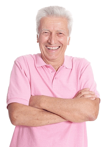 smiling older adult pink polo shirt