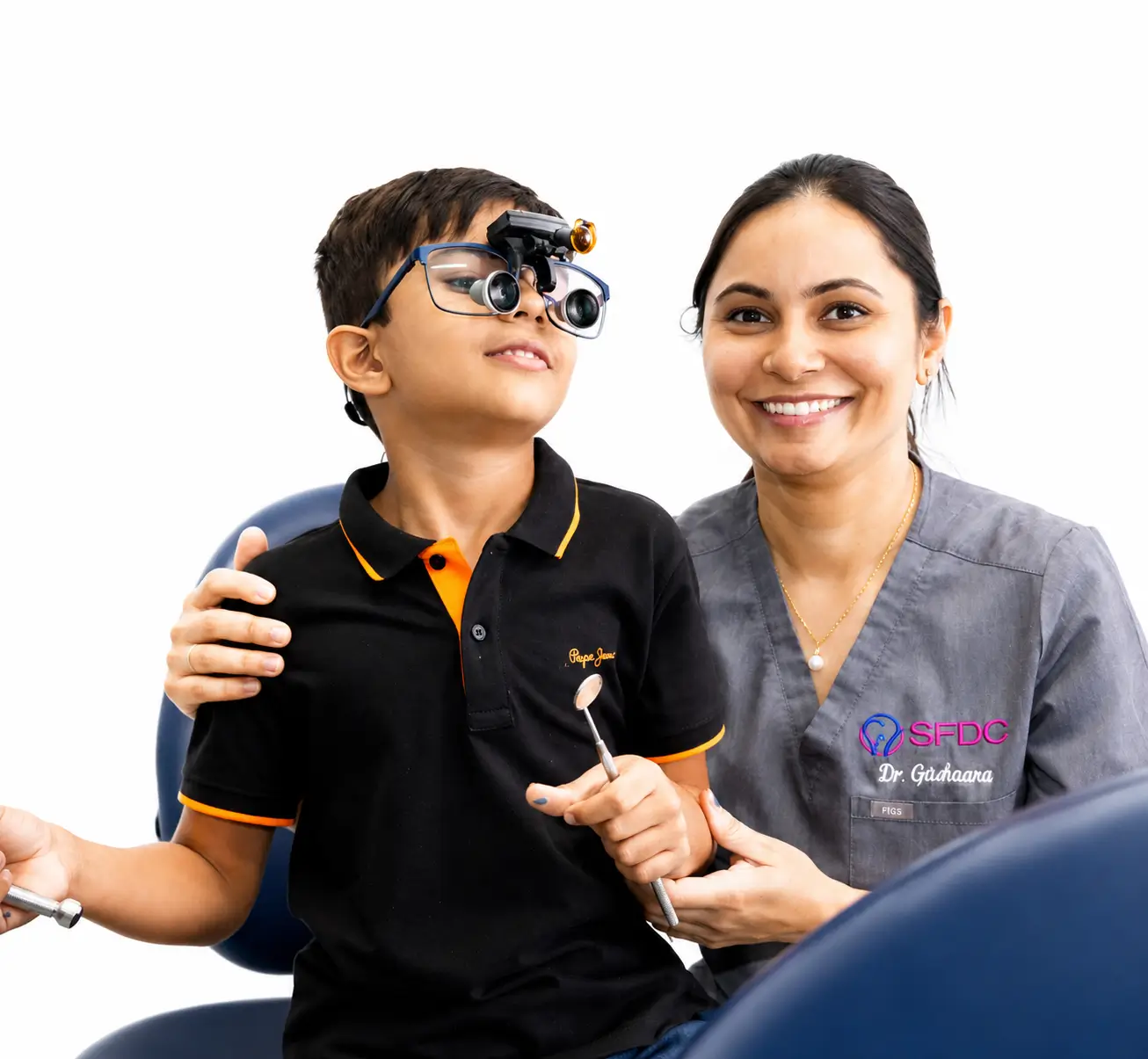 Clinician from Southside Friendly Dental Care with a child wearing protective dental glasses