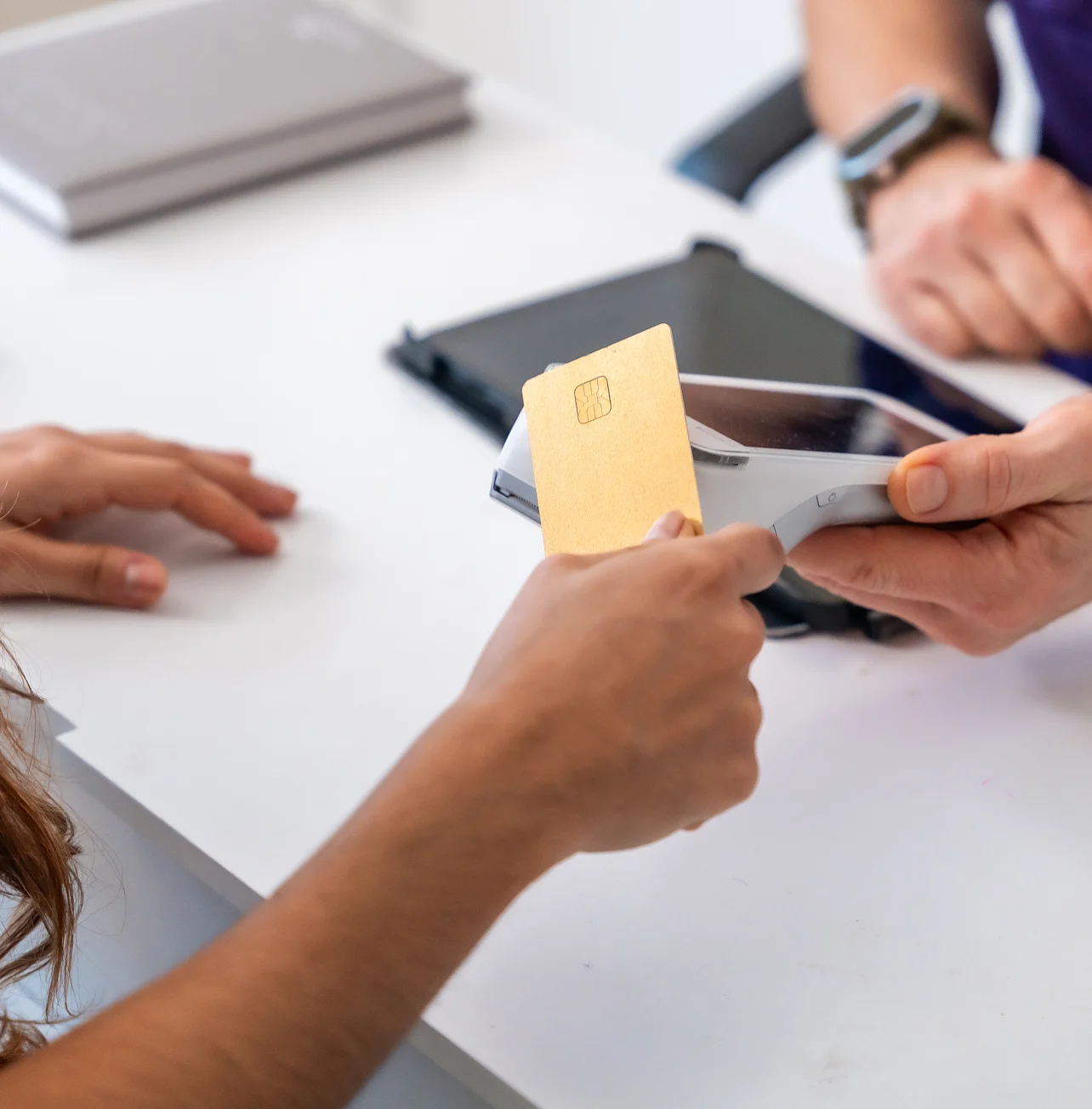 Card payment being processed on a payment terminal