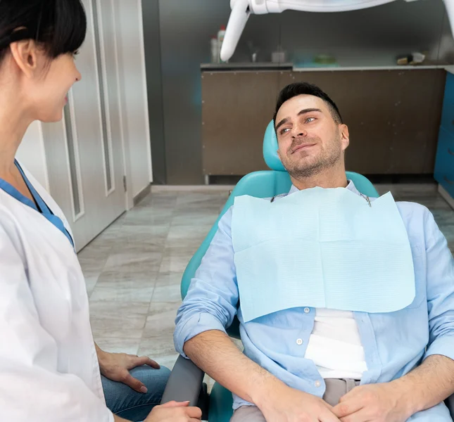dentist discussing dental care with patient