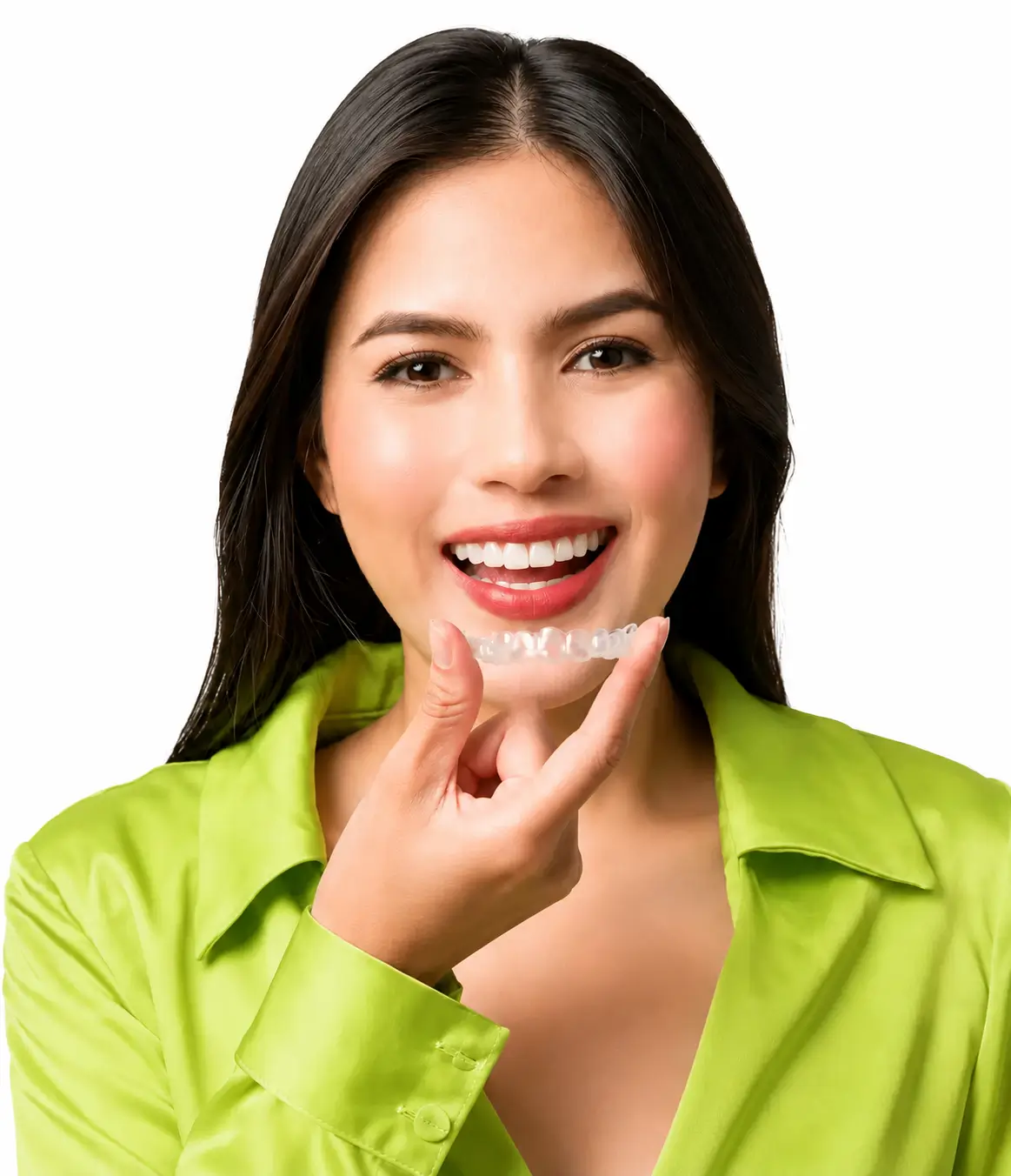 Person holding a clear aligner below their smile